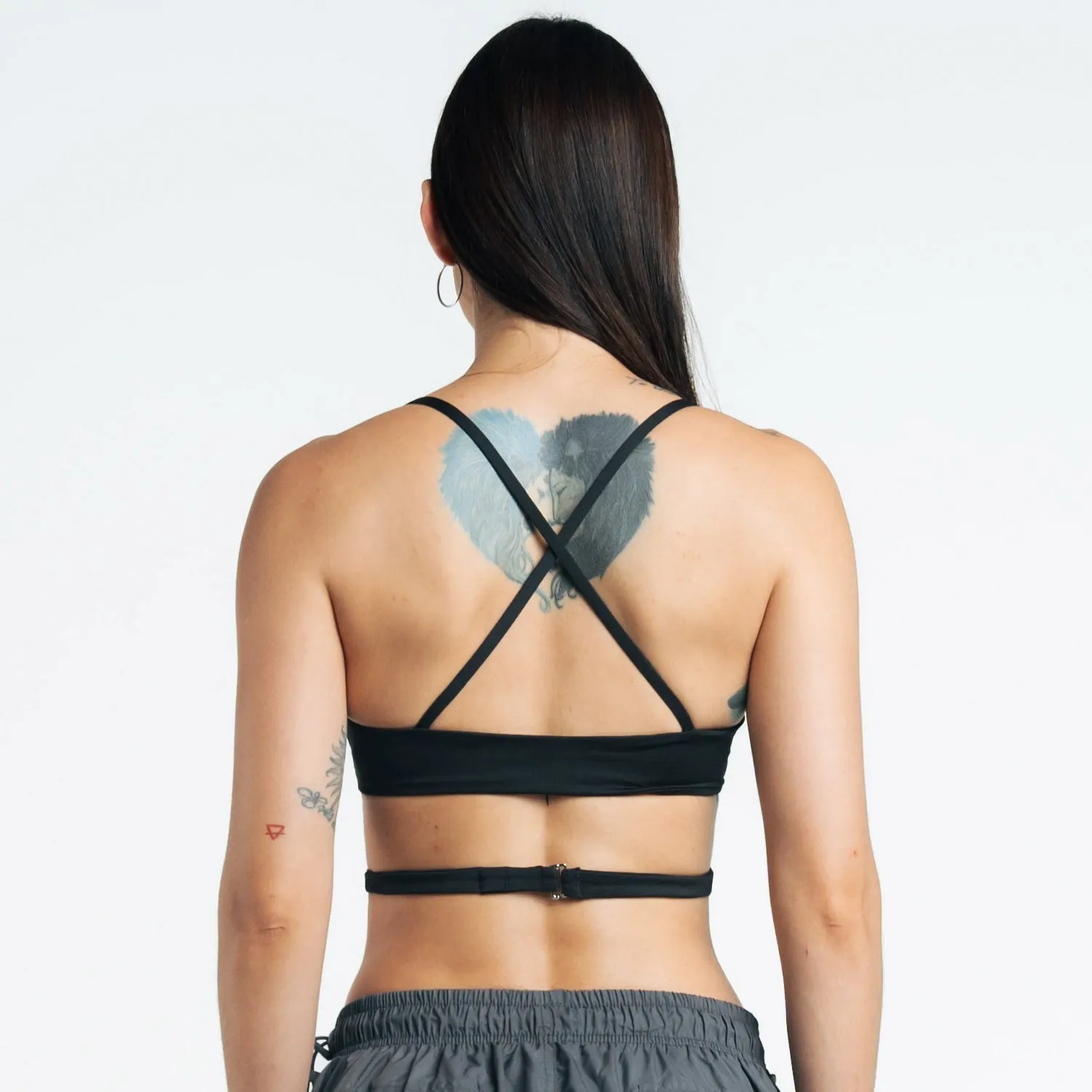 Black Cross Top by H.E.R. - Stylish & Versatile